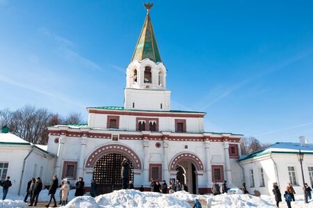 Moscow, Russia-March 09, 2018: Kolomenskoye with ancient Front gates during the sunny day, tourists go sightseeing. Kolomenskoye is a former Royal estate located in the southern part of Moscow.のeditorial素材
