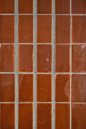 Tiled wall brownの写真素材