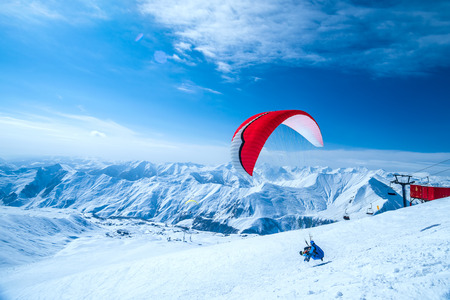 Winter in Greater Caucasus Mountains. Gudauri, Georgia (country). Paraglidingの写真素材