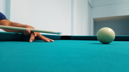 young pro billiard player finding best solution and right angle at billard or snooker pool sport  gameの写真素材