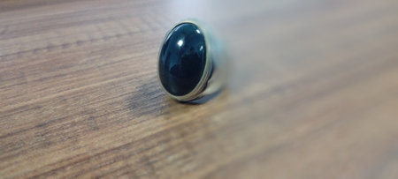 Close up of a Ring with Bacan stone, Bacan stone with the scientific name Krisokola. This stone is an important gemstone during the sultanates of Bacan, Jailolo, Tidore and Ternate, Indonesiaの写真素材