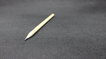Pencil on a black background, close-up, selective focusの写真素材