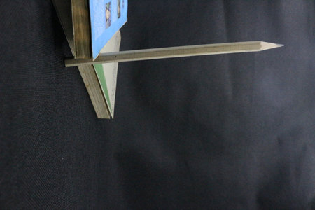 Pencils and book on a black background. Back to school, close-up. Education concept. Copy space.の写真素材