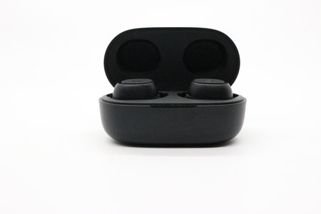 Black  earphones with white background.の写真素材