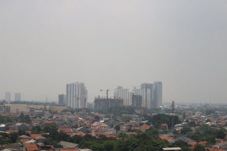 View of tall buildings, seen from the rooftop.の写真素材