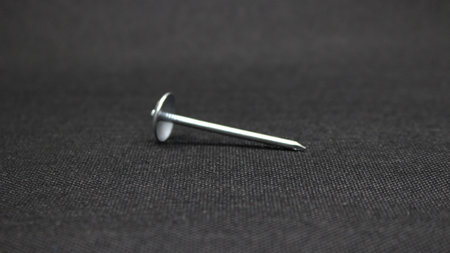 Zinc or asbestos nails. Made of iron with a round head resembling an umbrella. Often called tacks.の写真素材