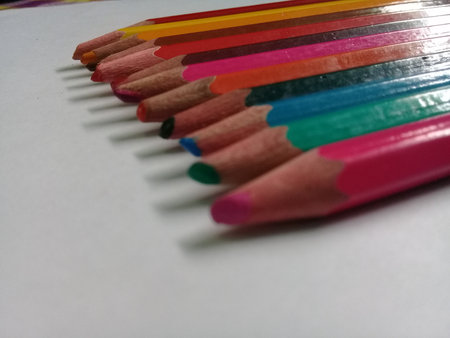 Blunt colored pencil with shadow on white backgroundの写真素材