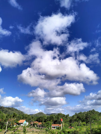 Blue sky with beautiful clouds during the dayの写真素材