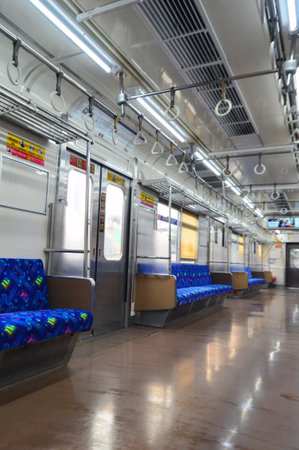 Interior Commuter Line or electric train in Jakarta, Indonesia. In the photo from the right angle,...