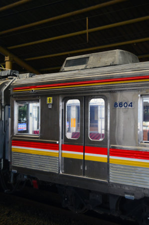 Commuter Line or electric train in Jakarta, Indonesia. In the photo from the right angle, which illustrates the splendor of this electric train.の写真素材