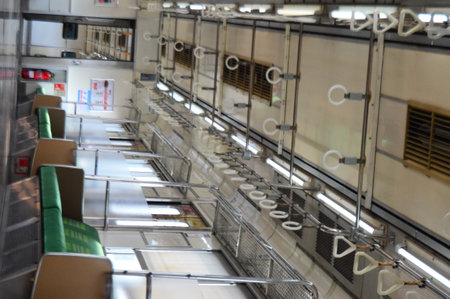 Interior Commuter Line or electric train in Jakarta, Indonesia. In the photo from the right angle,...