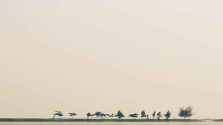 View of the sea, where you can see small islands and ships and banana boats. Beautiful Ancol Beach.の写真素材