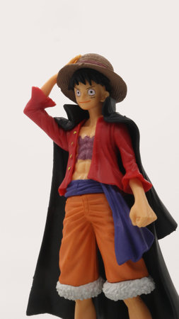 One piece Luffy action figure standing isolated on white background