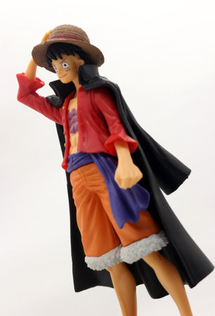 One piece Luffy action figure standing isolated on white background