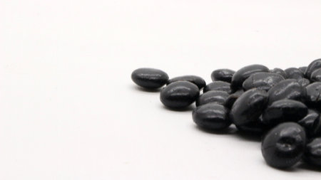Choco chips, chocolate-flavored food and drink toppings. With a round shape and black or brown color.の写真素材