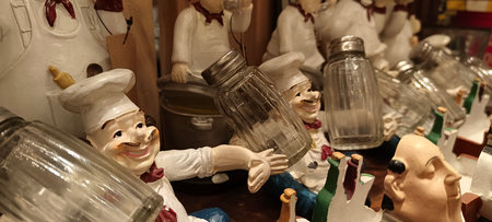 Toy shaped like a chef holding a glass in a shop