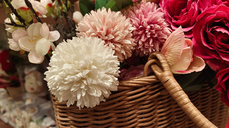 Beautiful decorative flowers displayed in the shop in various colorsの写真素材