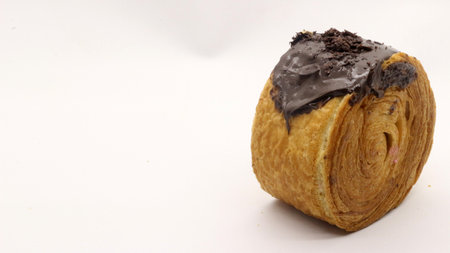 Cromboloni cake with chocolate topping. looks very tasty and increases appetite.の写真素材