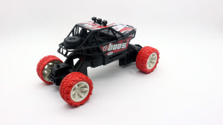 Remote control car toy, black and red jeep type.