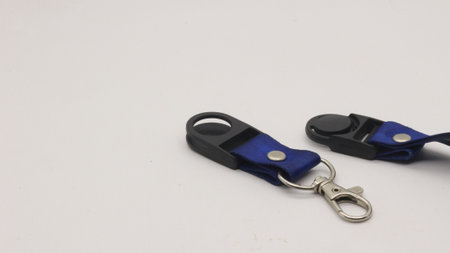 Blue neck strap with white background