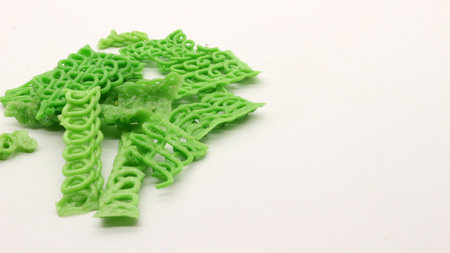 Colorful crackers or krupuk unfried isolated on white backgroundの写真素材