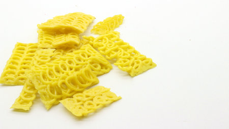 Colorful crackers or krupuk unfried isolated on white background