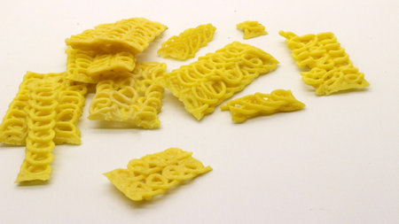 Colorful crackers or krupuk unfried isolated on white backgroundの写真素材