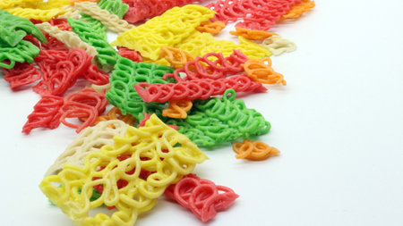 Colorful crackers or krupuk isolated on white backgroundの写真素材