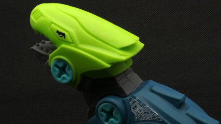 Dinosaur toy isolated on black backgroundの写真素材