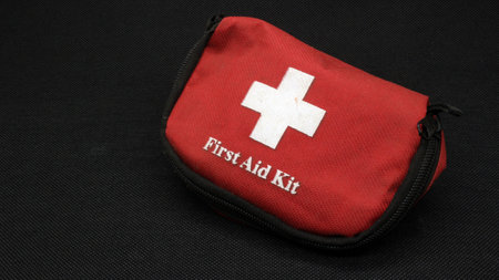 First aid kit isolated on black backgroundの写真素材