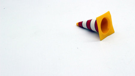Traffic cone toys are made of plastic with a white background.