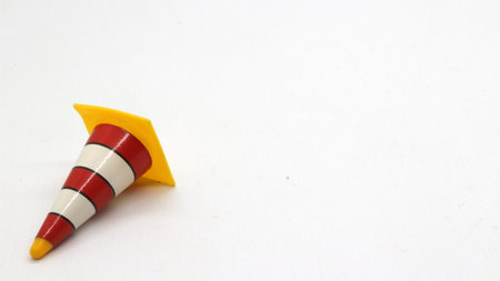 Traffic cone toys are made of plastic with a white background.の写真素材