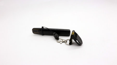 Black vape or electronic cigarette with hanger, white background