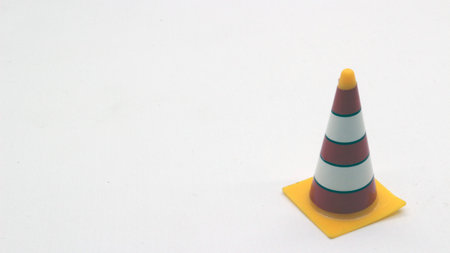 Traffic cone toys are made of plastic with a white background.