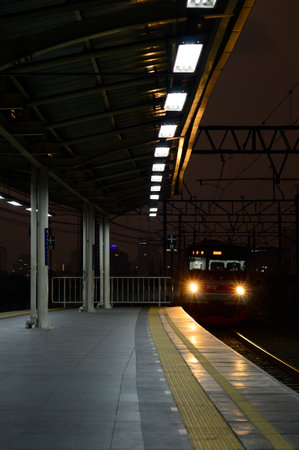 Beautiful view of train passing on the tracks in the cityの写真素材
