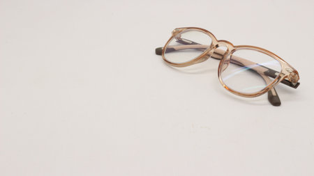 New glasses are brown with white background.