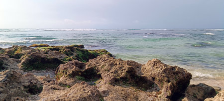 Beautiful view on suluban beach with big rocks in bali indonesiaの写真素材