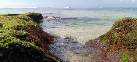 Beautiful view on suluban beach with big rocks in bali indonesiaの写真素材