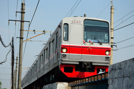 Beautiful view of train passing on the tracks in the city