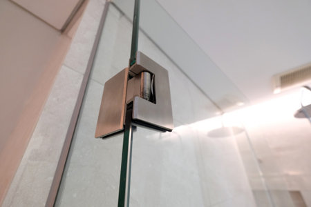 Close up of glass shower door in bathroomの写真素材