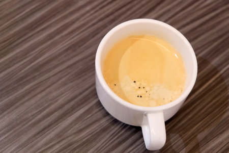 Close up Coffee latte in white cupの写真素材