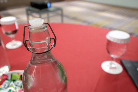 Empty glass glasses and bottles for drinkingの写真素材