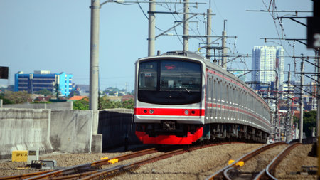 Beautiful view of train passing on the tracks in the cityの写真素材