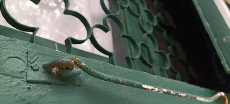 Close up of vintage green wooden window in old buildingの写真素材