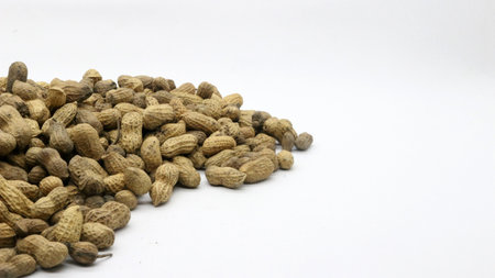 Shelled peanuts isolated on white background