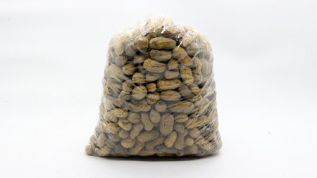 Shelled peanuts isolated on white background