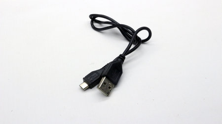 Black USB to micro USB cable isolated with white background