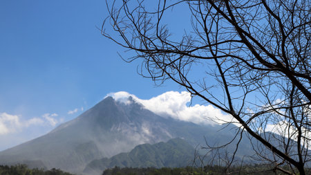 View of Mount Merapi with beautiful clouds and sky