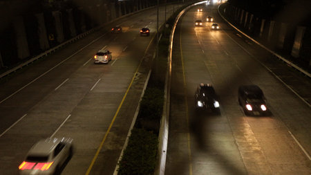 View of the highway in Jakarta city from the pedestrian bridge at night