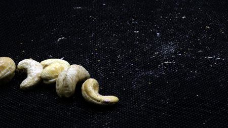 Cashew nuts isolated on black background